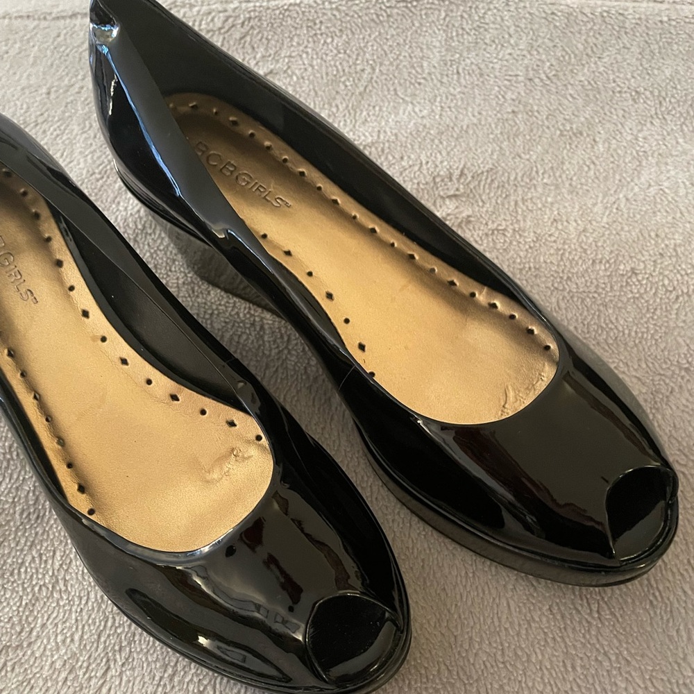 BCBG black patent leather wedges.